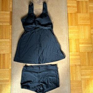 Black two piece bathing suit. NWOT never worn. Size M